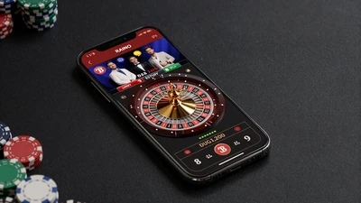 Mobiles Live Casino-Interface mit Roulette-Tisch und Live-Dealer auf Smartphone - Vox Casino mobiles Live Casino